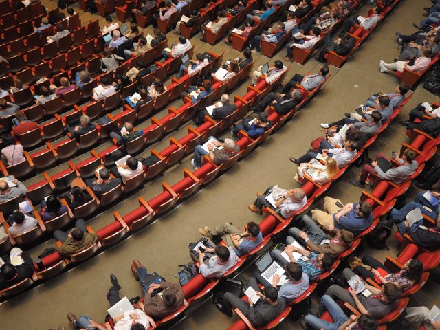 Photo of people attending a conference